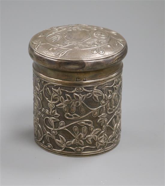 An Edwardian repousse silver cylindrical box and cover, Birmingham, 1901, 83mm.